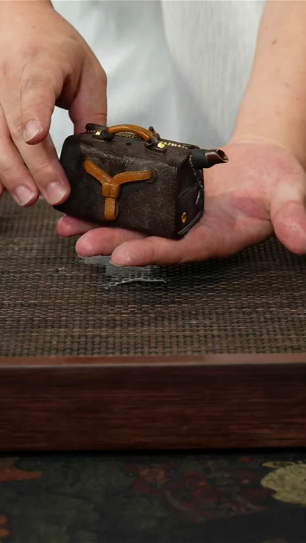 茶壶紫砂包包壶估计要贵阳