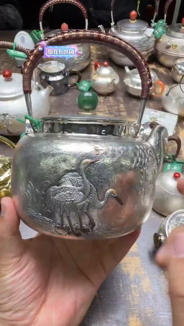 k呆坐细锤纹浮雕錾刻嵌金松鹤提梁煮水壶