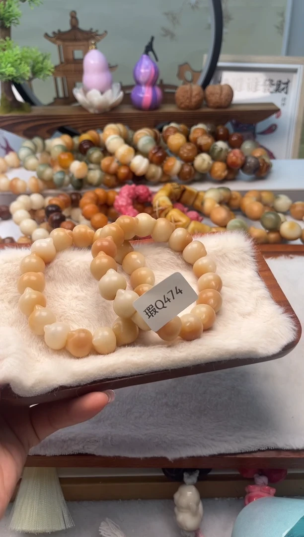 【闪购商品】菩提根/象牙果手串15mm瑕猫头随机一串不挑q474