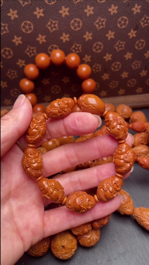橄榄核手串别****?1.4刘人义弥勒