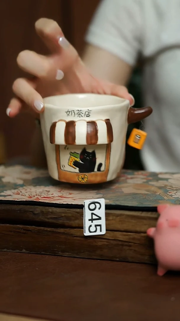 喵喵设计师 手握