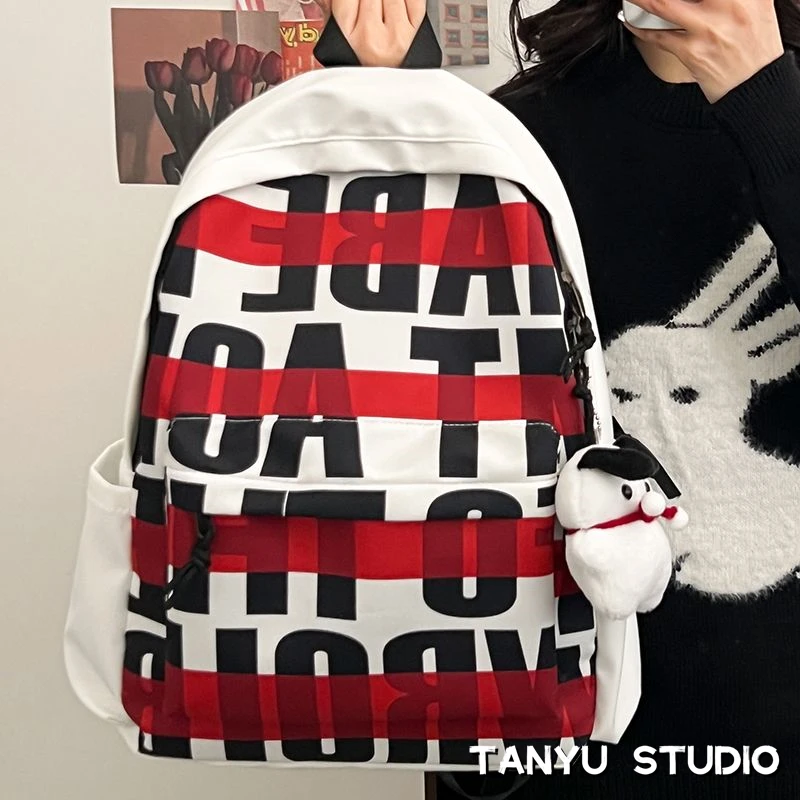 探屿韩系高颜值耐脏书包大容量双肩包高中生字母印花电脑包背包