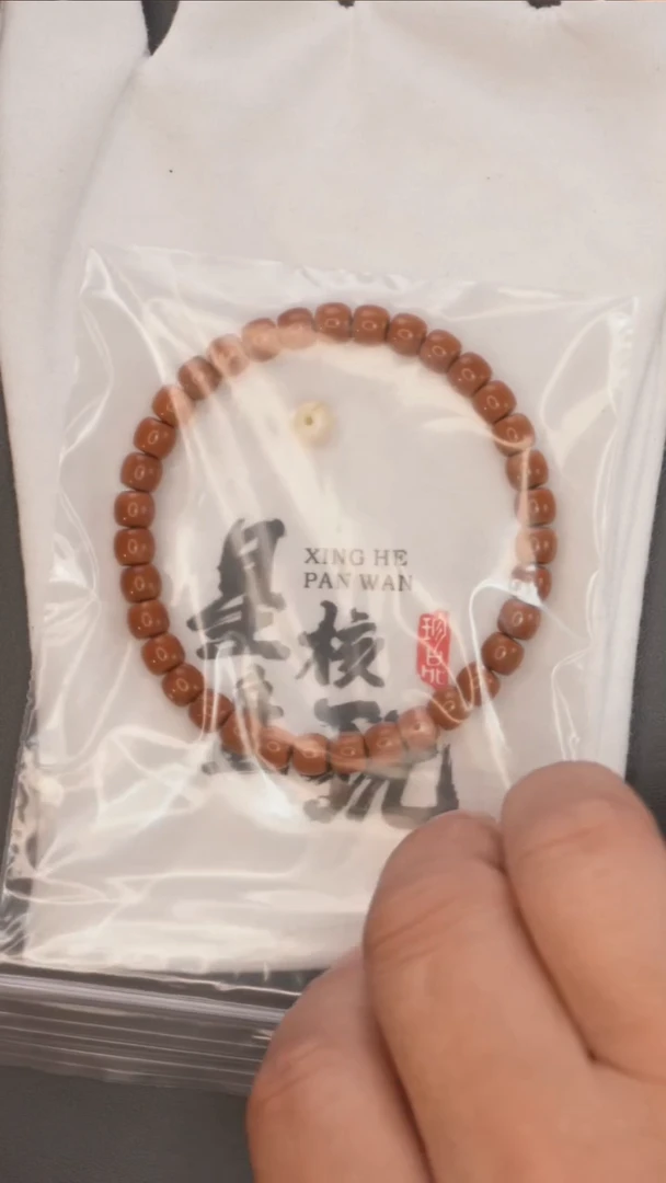 橄榄核手串清*?6.6mm老挝红核极限弧微三花印记手串