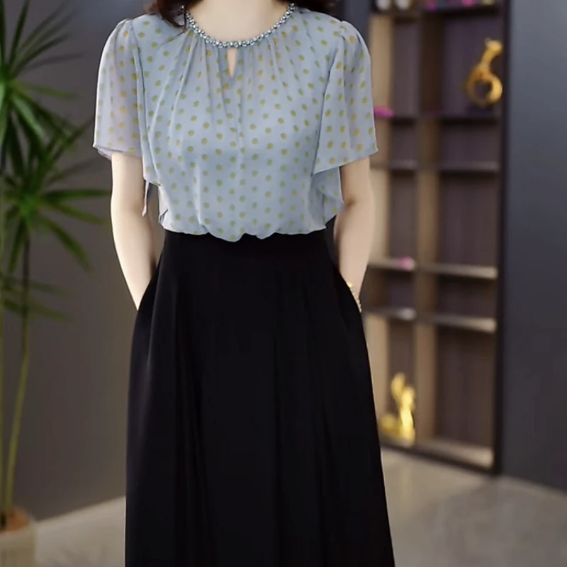 2025夏季新款时尚优雅气质设计感波点收腰显瘦洋气遮肚减龄连衣裙