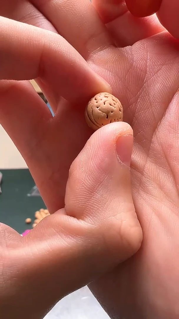 把件桃核打****?10mm小金蛹桃核单颗 3号