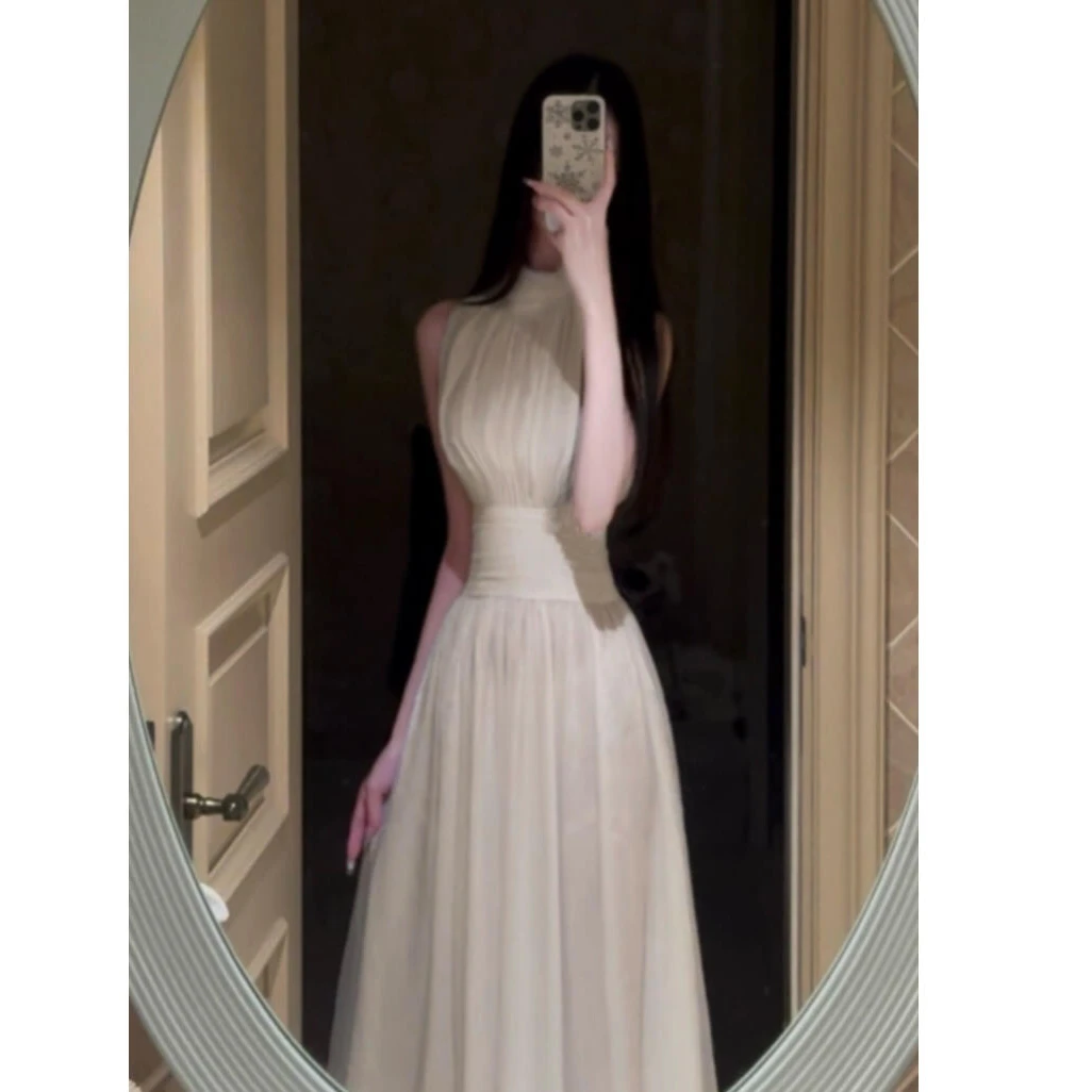 2025春夏新款时尚气质小众茶歇式仙女米白色仙女中长款连衣裙女