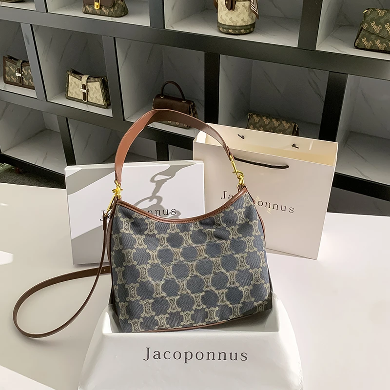 真皮凯旋门托特包女2024新款秋轻奢小众高级感通勤百搭大容量斜挎