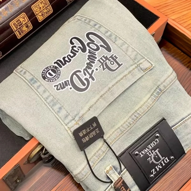 维斯克纳夏季薄款潮牌印花牛仔裤男士修身小直筒弹棉时尚流行裤