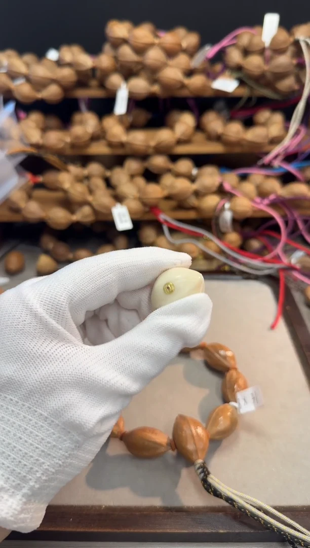 橄榄核手串20象牙果三通带标