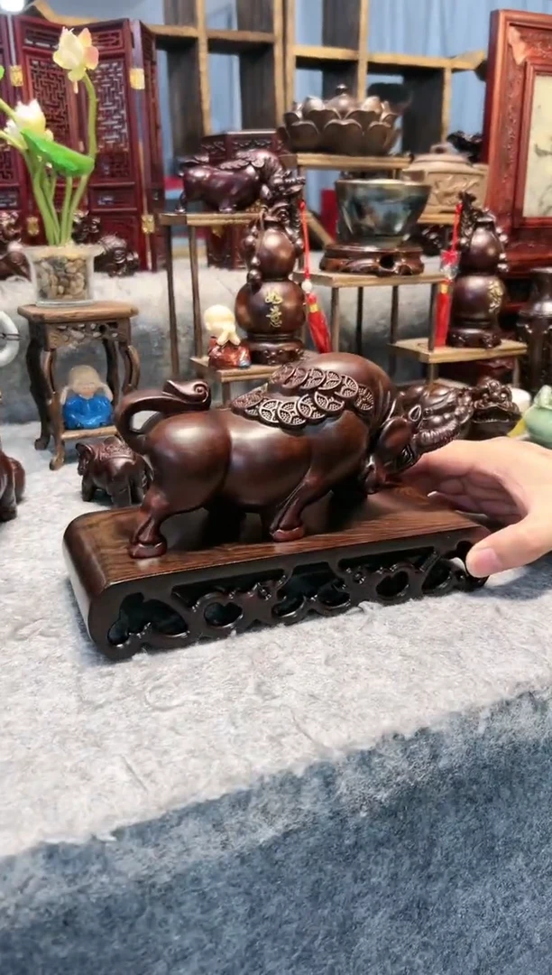 风车木（黑檀木）20公分金钱牛+22书卷底座一套