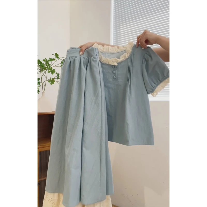 蓝色独特好看减龄小套装女2025夏季法式蕾丝拼接上衣半身裙两件套