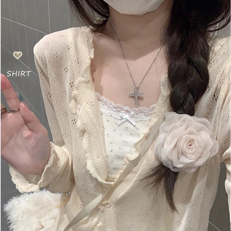 韩系镂空薄款防晒针织衫女春季2025新款别致宽松短款长袖开衫上衣