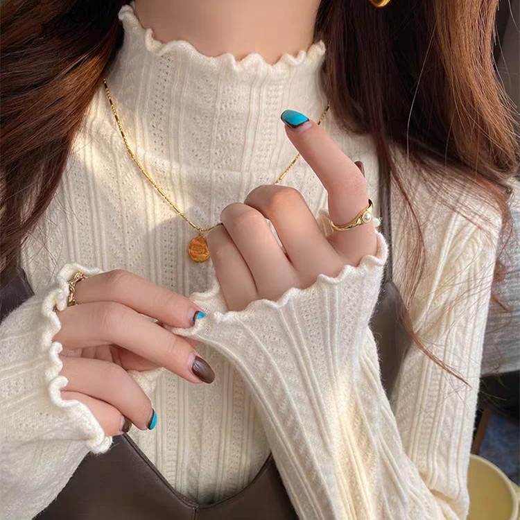 2025新款秋冬白色木耳边打底衫女内搭高级感半高领毛衣针织衫上衣