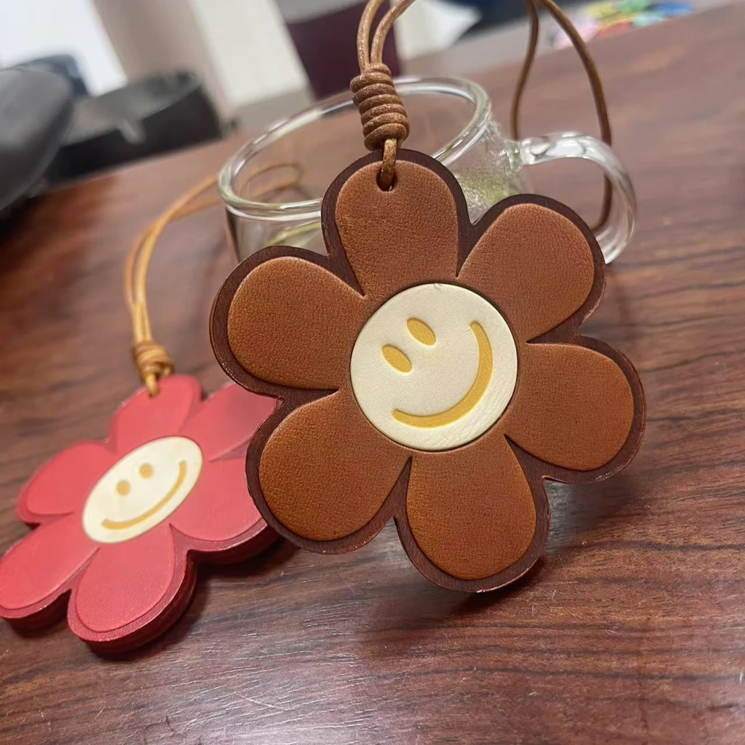 West impression西部2025头层牛皮时尚百搭饰品钥匙扣挂件太阳花