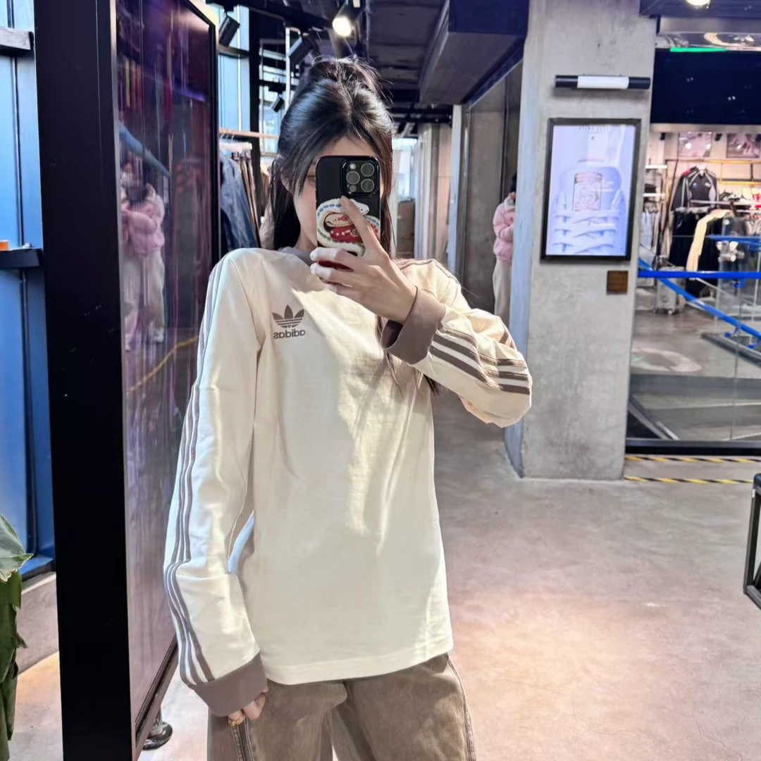 adidas三条纹欧若风纯棉运动修身时尚内搭长袖圆领T恤JN7022