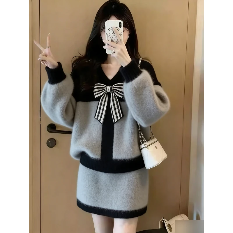 温柔风毛绒蝴蝶结套装女秋冬显瘦甜美针织两件套大码长袖条纹毛衣