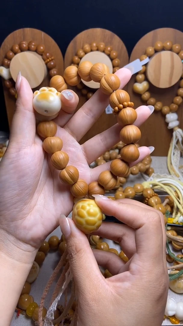 手串猴头核桃我****呀全品猫爪橄榄壳富甲三通粉白流苏手持