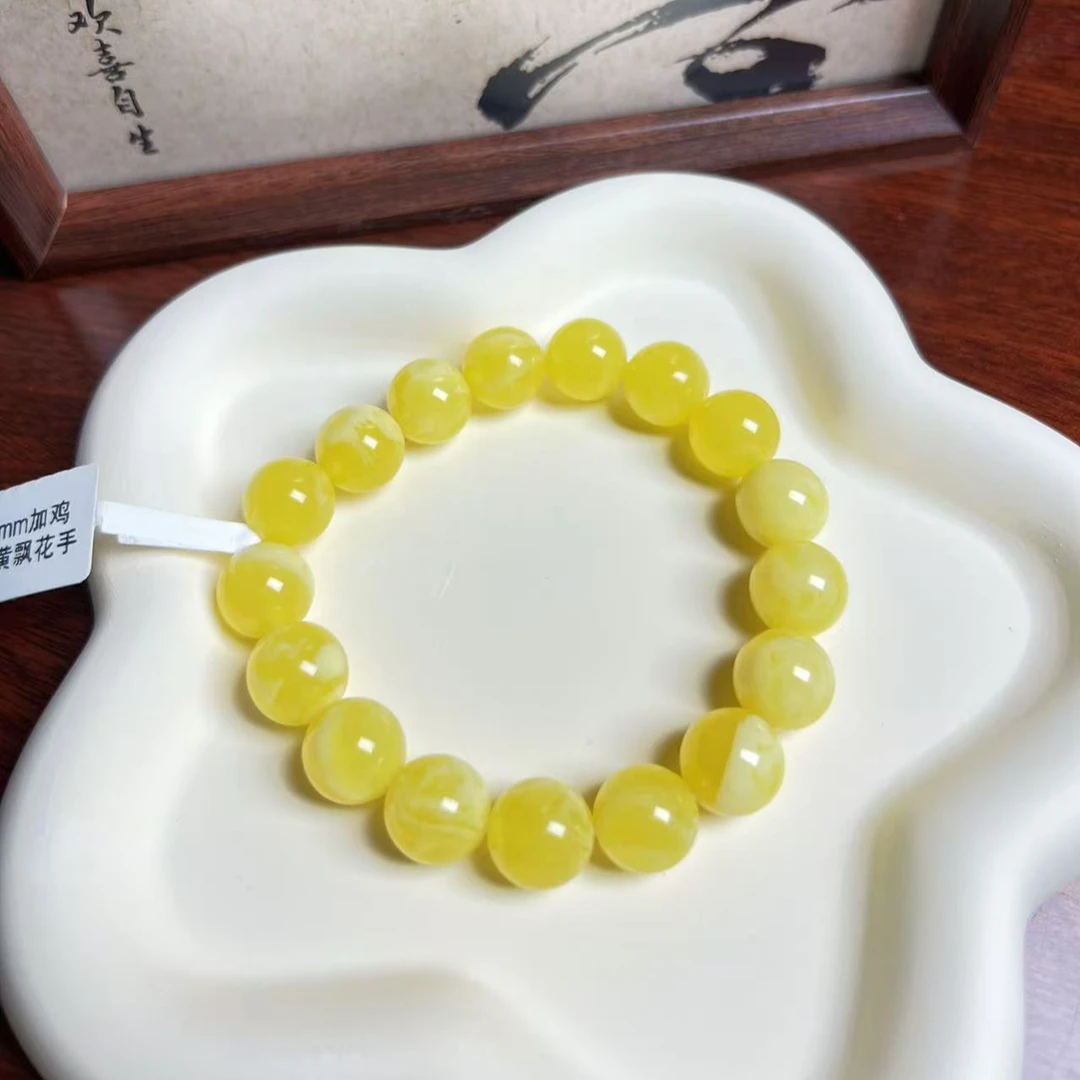 W007古巴新蜜鸡油黄飘花手串11mm+