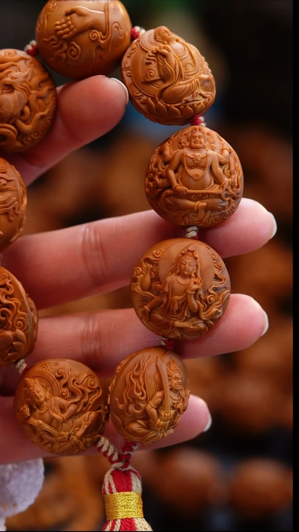 吊坠橄榄核往**风橄榄核