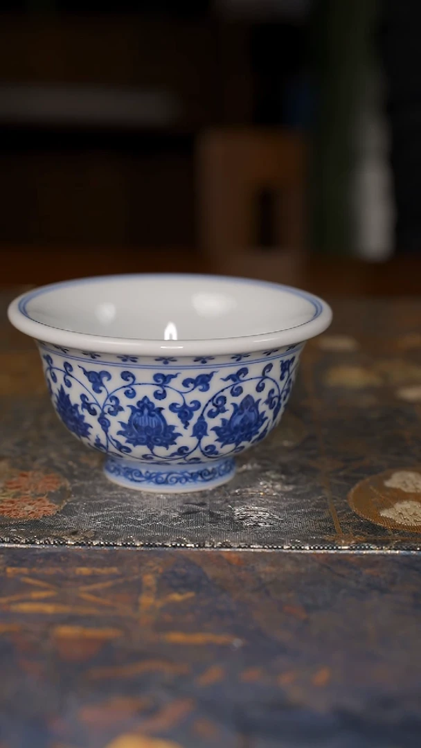 7****6窑望 狮心缠枝压手杯