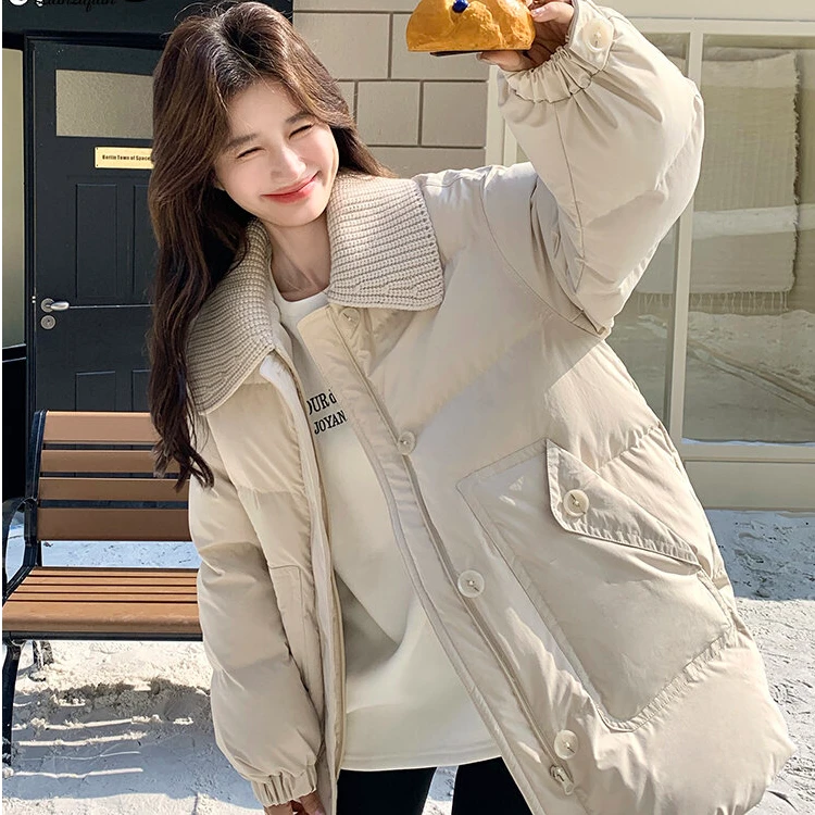 奥顿思兰迪米白色针织拼接翻领羽绒服女冬巨好看时尚白鸭绒厚外套