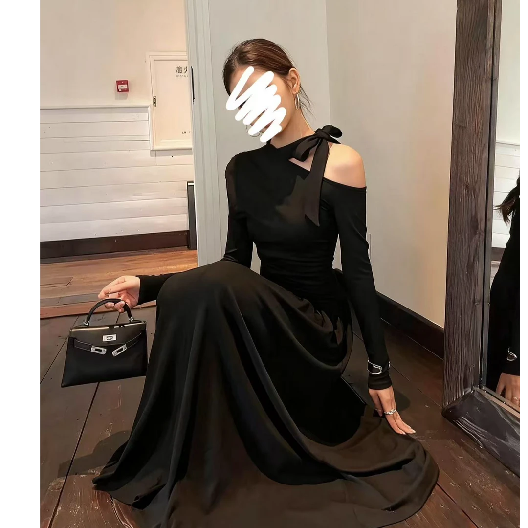 新款绝美洋装女不规则斜肩修身显瘦长袖连衣裙镂空露肩黑色大摆裙