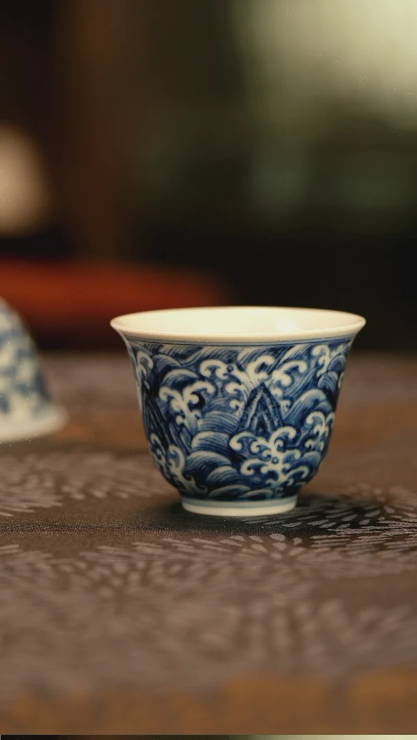 &***云仿明青花江崖海水铃铛杯