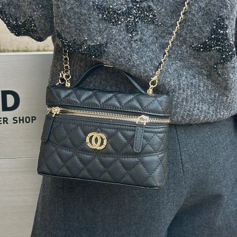 大小与新款时尚洋气百搭圆圈标开盖双拉链单肩包76108