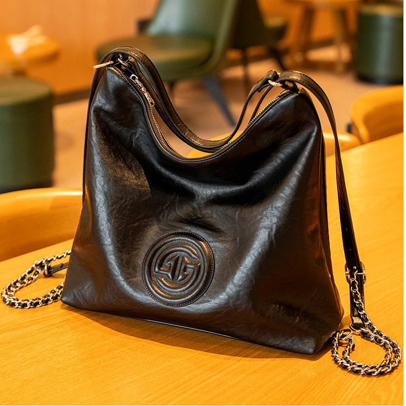 2025新款戈兰黛正品真皮软皮双肩包百搭休闲大容量单肩斜挎大包女