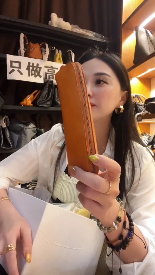 犏牛皮（革）珊瑚店清斜挎包真皮包时尚百搭包包