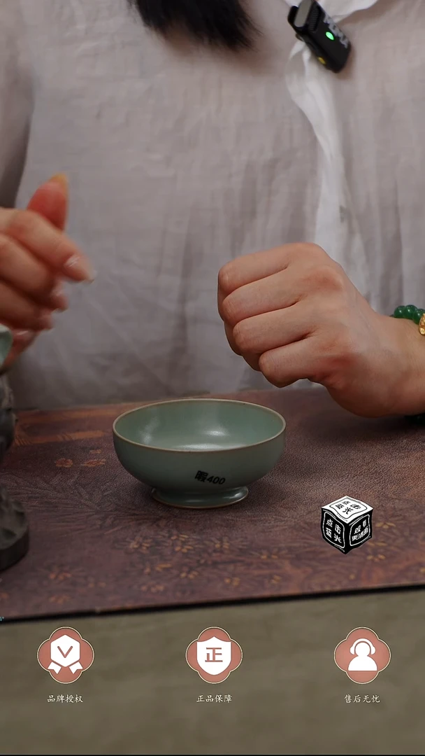 瓷片400瑕匠工款君绿釉普洱杯....