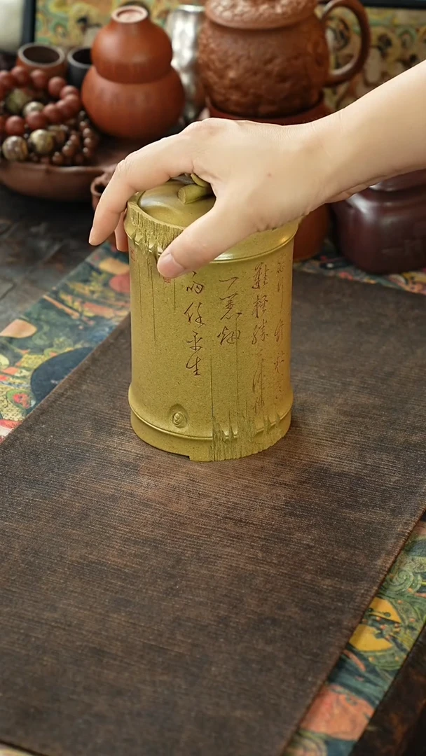本山绿仿竹节刻绘定风波紫砂茶叶罐