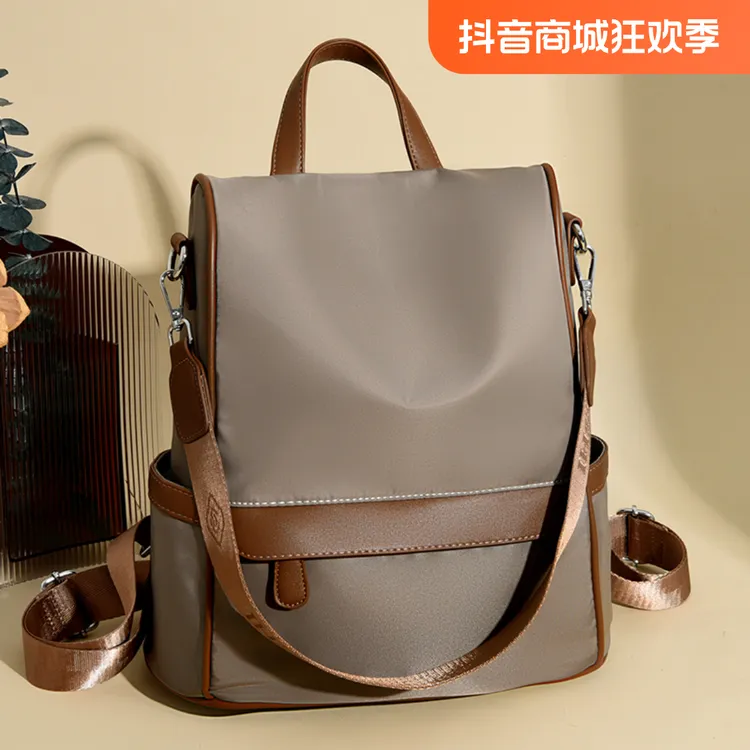 牛津双肩包女2025新款时尚百搭旅行轻便女士背包轻便通勤包sl6312