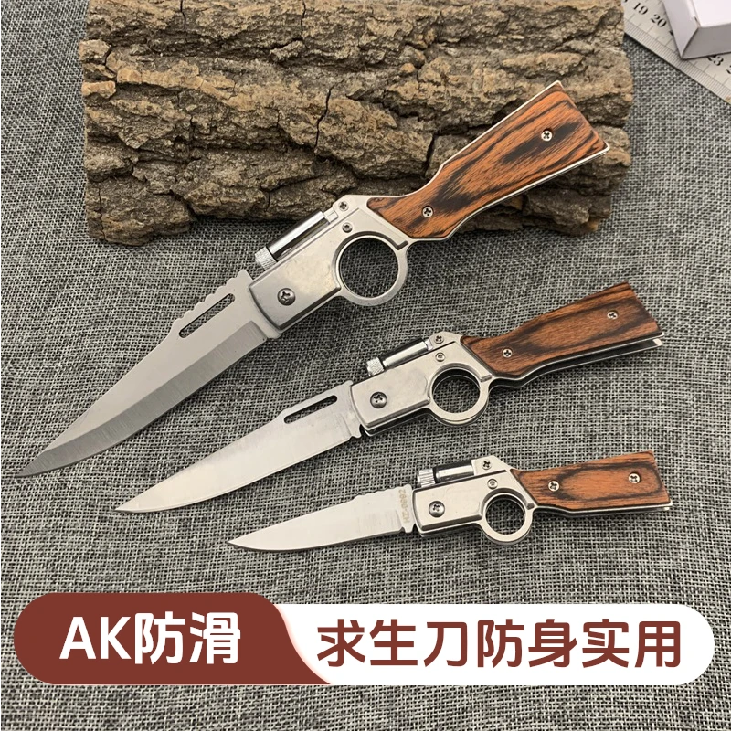 家用户外按钮启动AK折叠刀野营求生战术防身不锈钢电筒水果刀