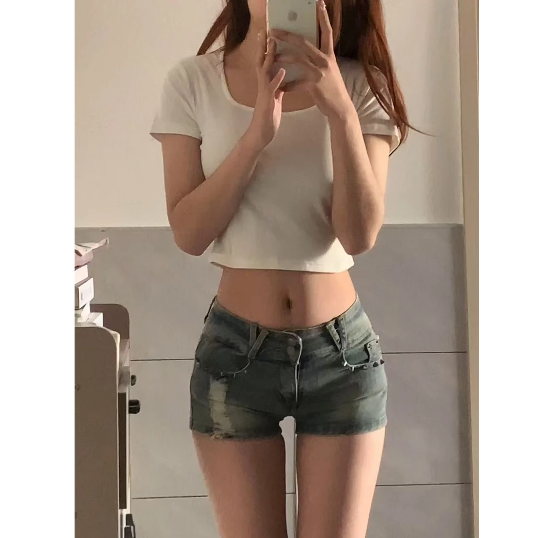 低腰铆钉破洞弹力牛仔短裤女夏季辣妹薄款水洗紧身包臀显瘦热短裤