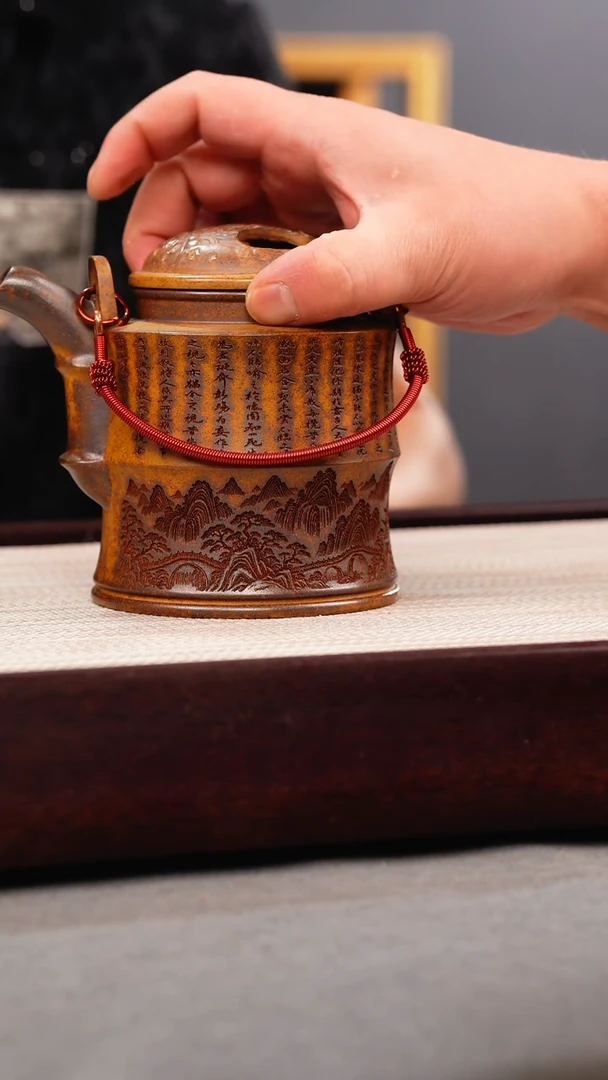 茶壶紫砂龙骨金砂 曲提梁 刻绘