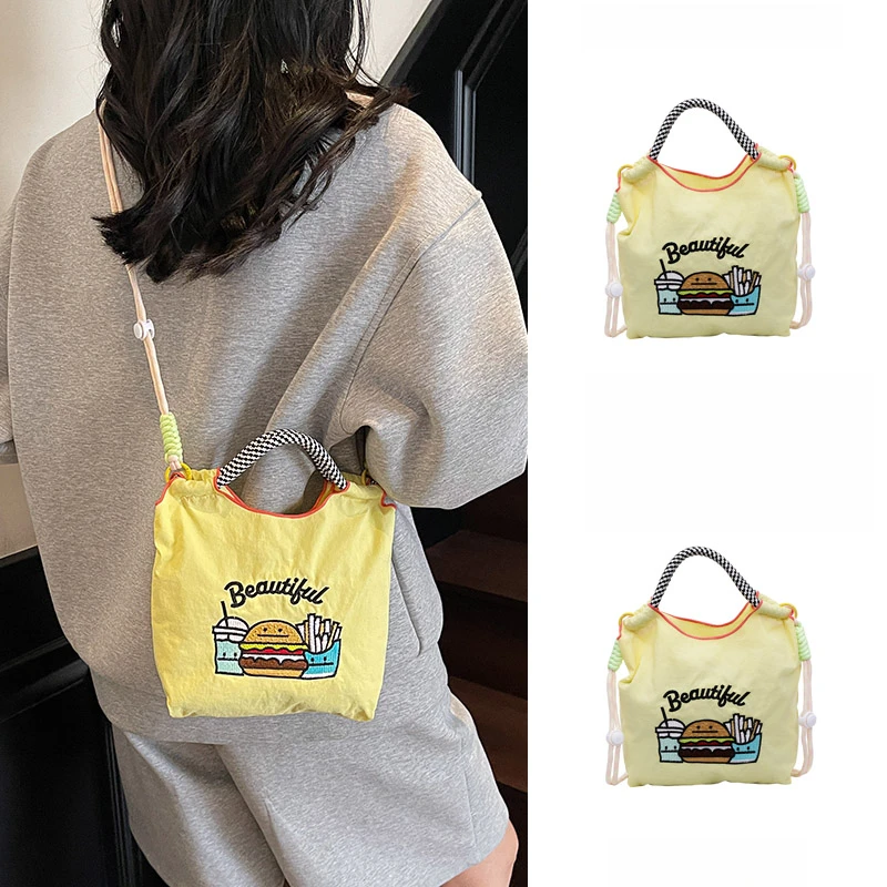 夏天大容量高级感上班通勤斜挎包包女2025新款刺绣汉堡帆布手提包