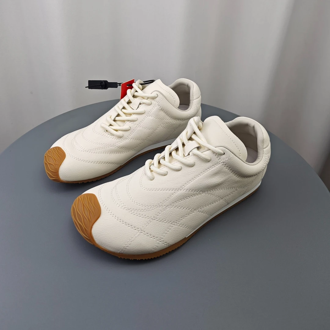 SGIRL TWTW简约时尚不规则阿甘德训鞋女2025新款平底轻便跑步板鞋