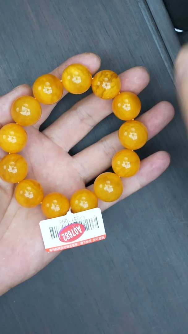 【闪购商品】琥珀裸石未镶嵌老蜡圆珠微瑕手串