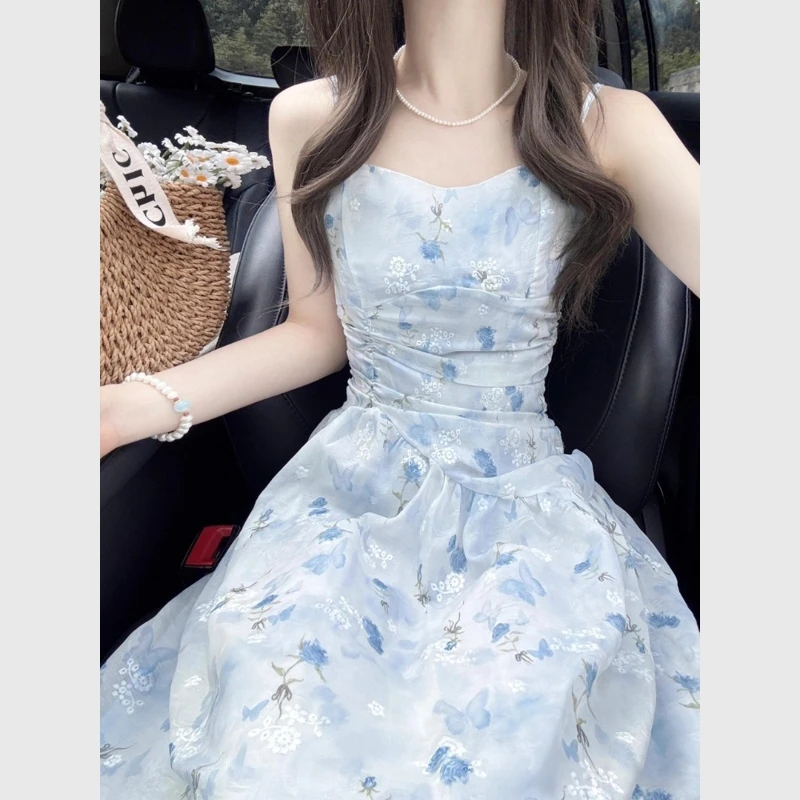 法式浪漫蓝色v领碎花吊带连衣裙夏季女装海边度假超好看显瘦裙子