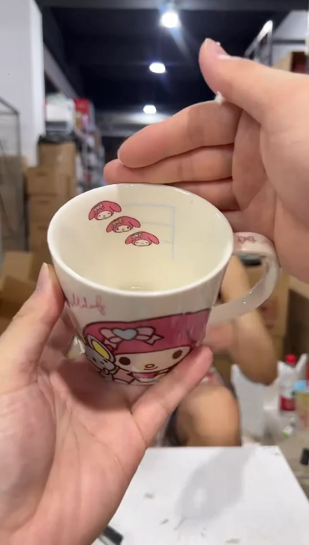 瓷片新款美乐蒂刻度马克杯