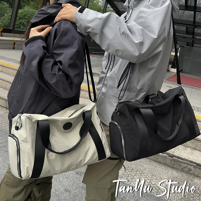 探屿品牌短途旅行包女手提大容量行李包女便携出差收纳行李袋子时