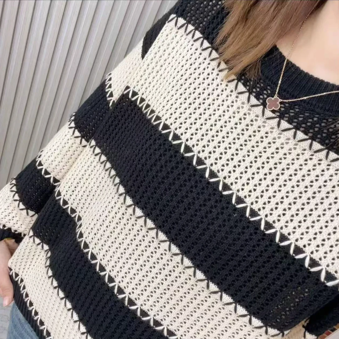 701#秋冬新款时尚百搭镂空条纹圆领女士针织衫90