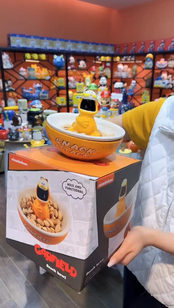 瓷片@@加菲猫陶瓷瓜子盘