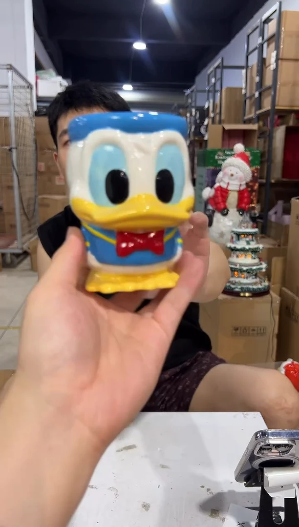 瓷片Q版唐老鸭水杯