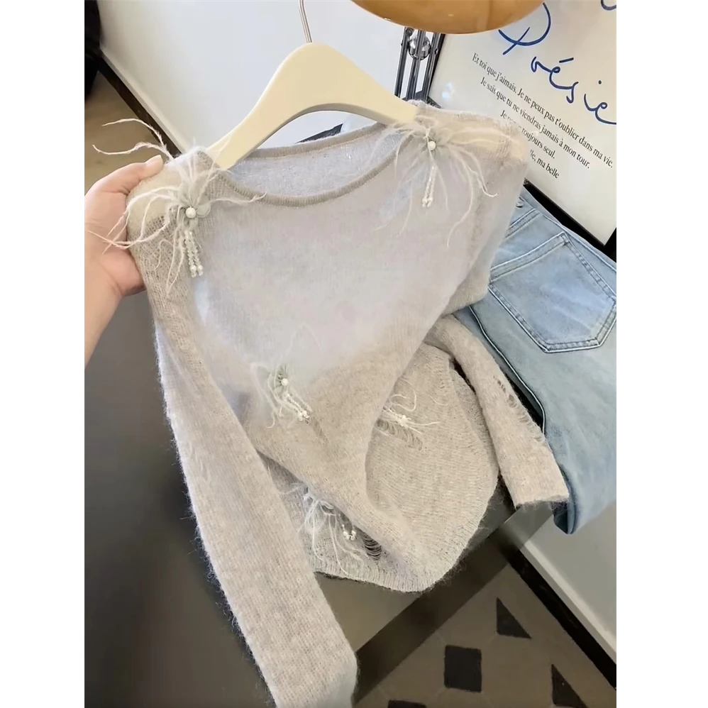 法式镂空破洞针织衫女2025早秋新款高级感慵懒风修身辣妹长袖上衣