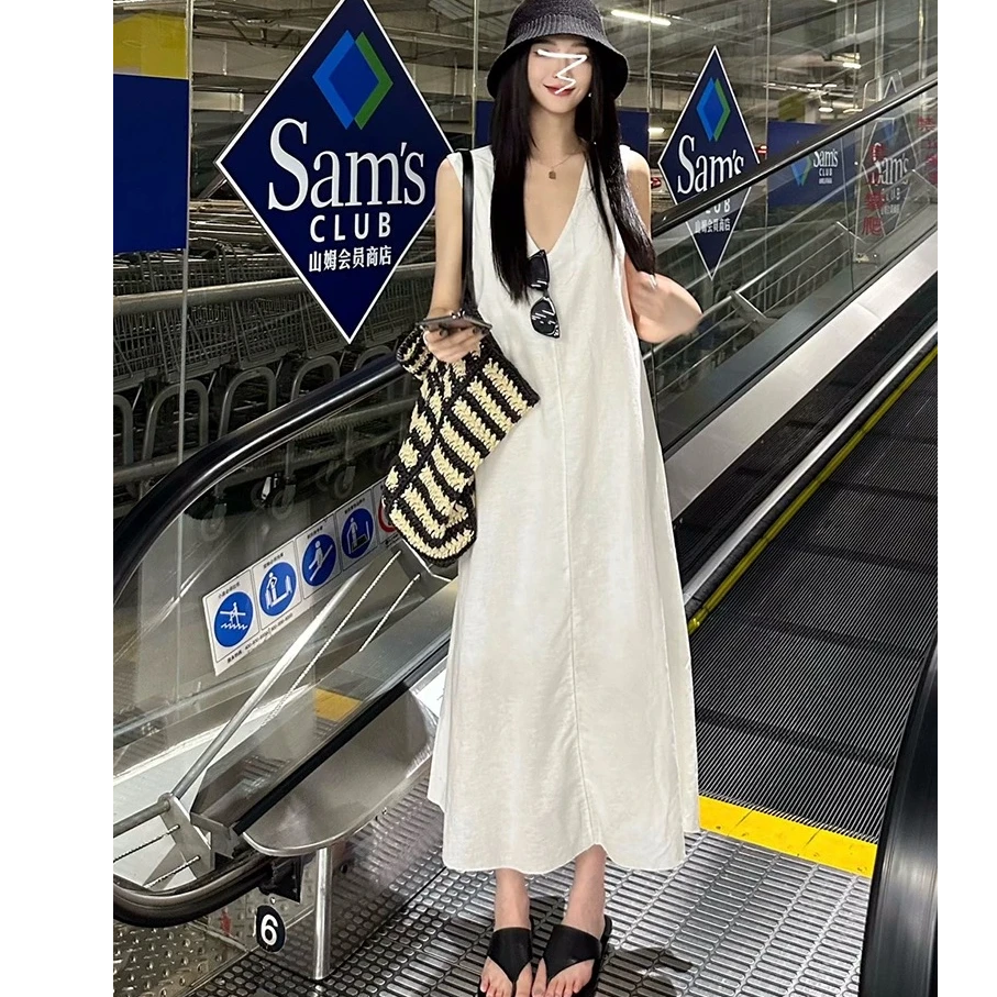 海边度假白色v领连衣裙子女夏季2025新款小众高级感显瘦气质长裙
