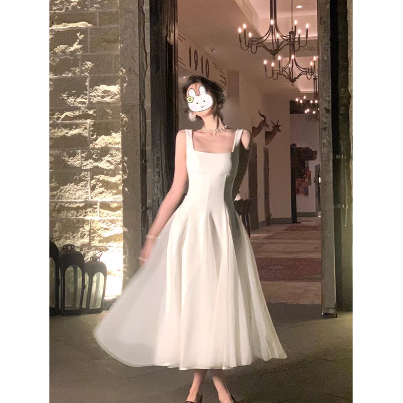 白色吊带连衣裙女夏季网纱蓬蓬仙女裙高级感领证长裙初恋小白裙