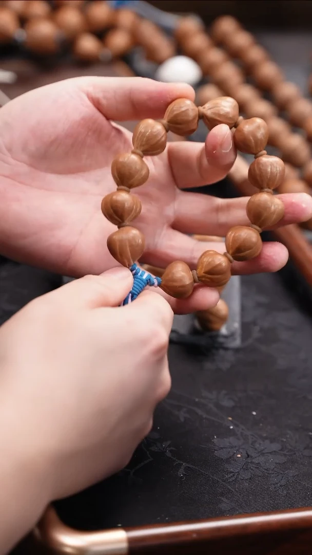 手串橄榄核小鸟三面佛18左右