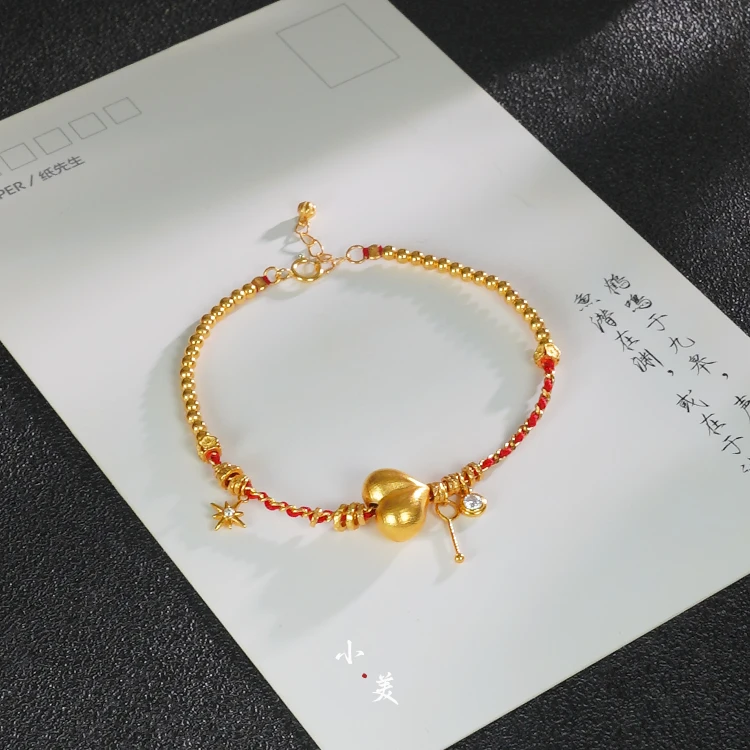 18K金屁桃爱心红绳手链（多样性发货） G9959